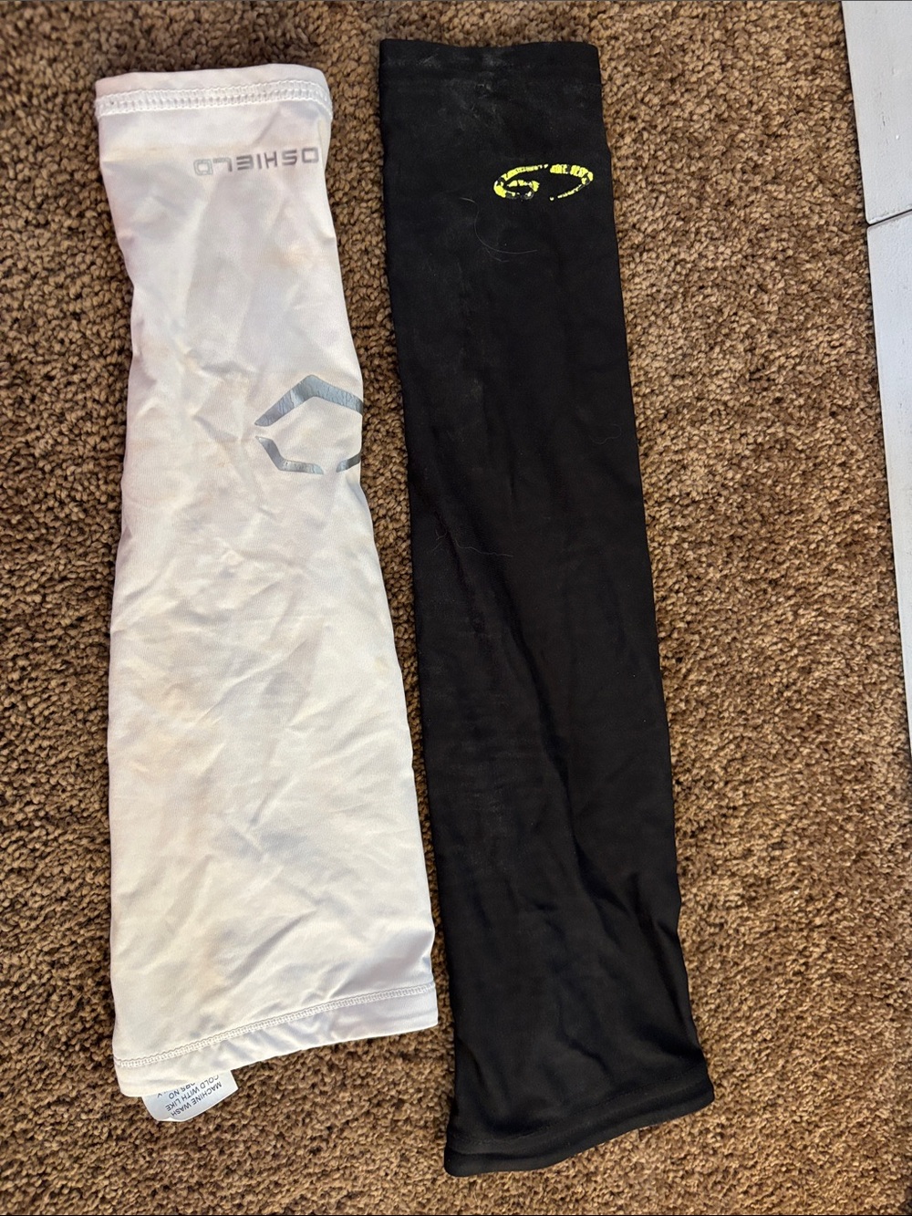 Black Arm Sleeve and white arm sleeve